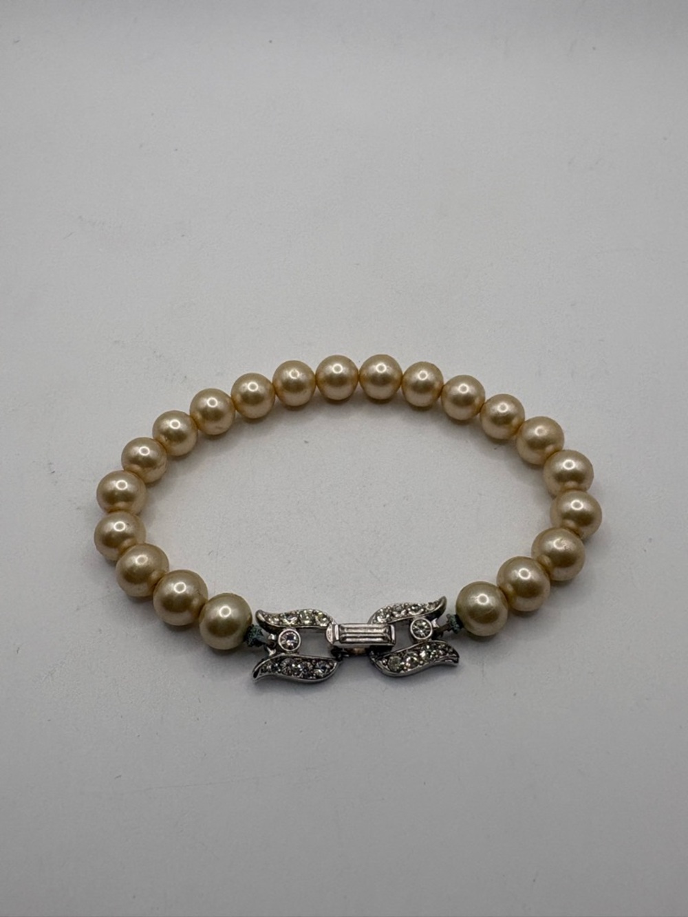 Trifari Gold-Tone Faux Pearl Bracelet with Rhinestone Bow Clasp